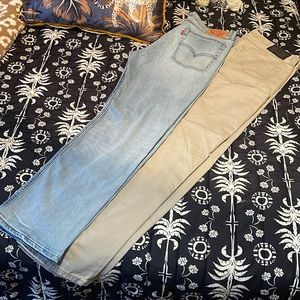 2 pair Levi’s 514 - khaki and light wash denim. Both 36x34, straight fit style.